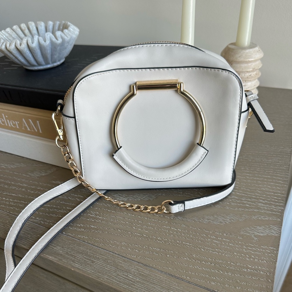 A New Day Ivory Crossbody Bag with Gold Ring Handles and Removable Strap